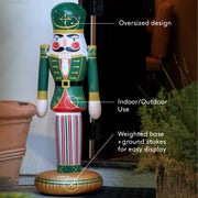 Decorative inflatable nutcracker with features highlighted, placed outdoors.